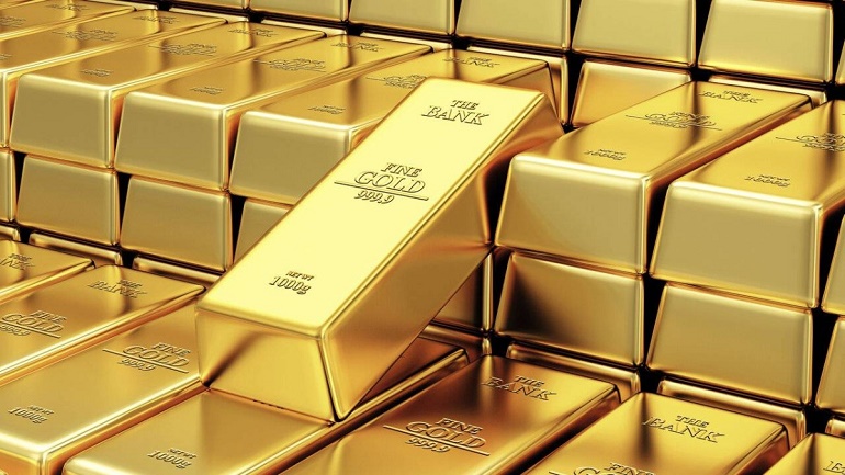 الذهب يتراجع عن أعلى مستوى له على الإطلاق وسط جني أرباح