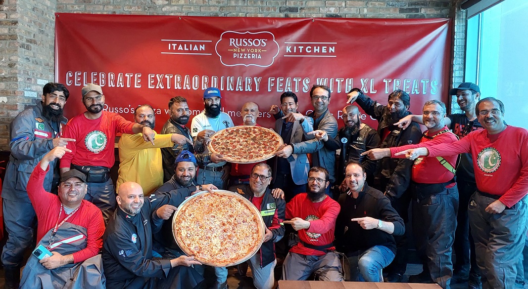 RUSSO’S HOSTS AN XL PIZZA PARTY FOR EXTRAORDINARY BIKER PILGRIMS